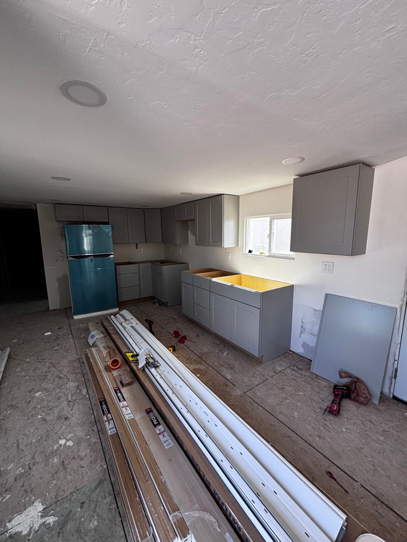 Base cabinets installed, awaiting countertops