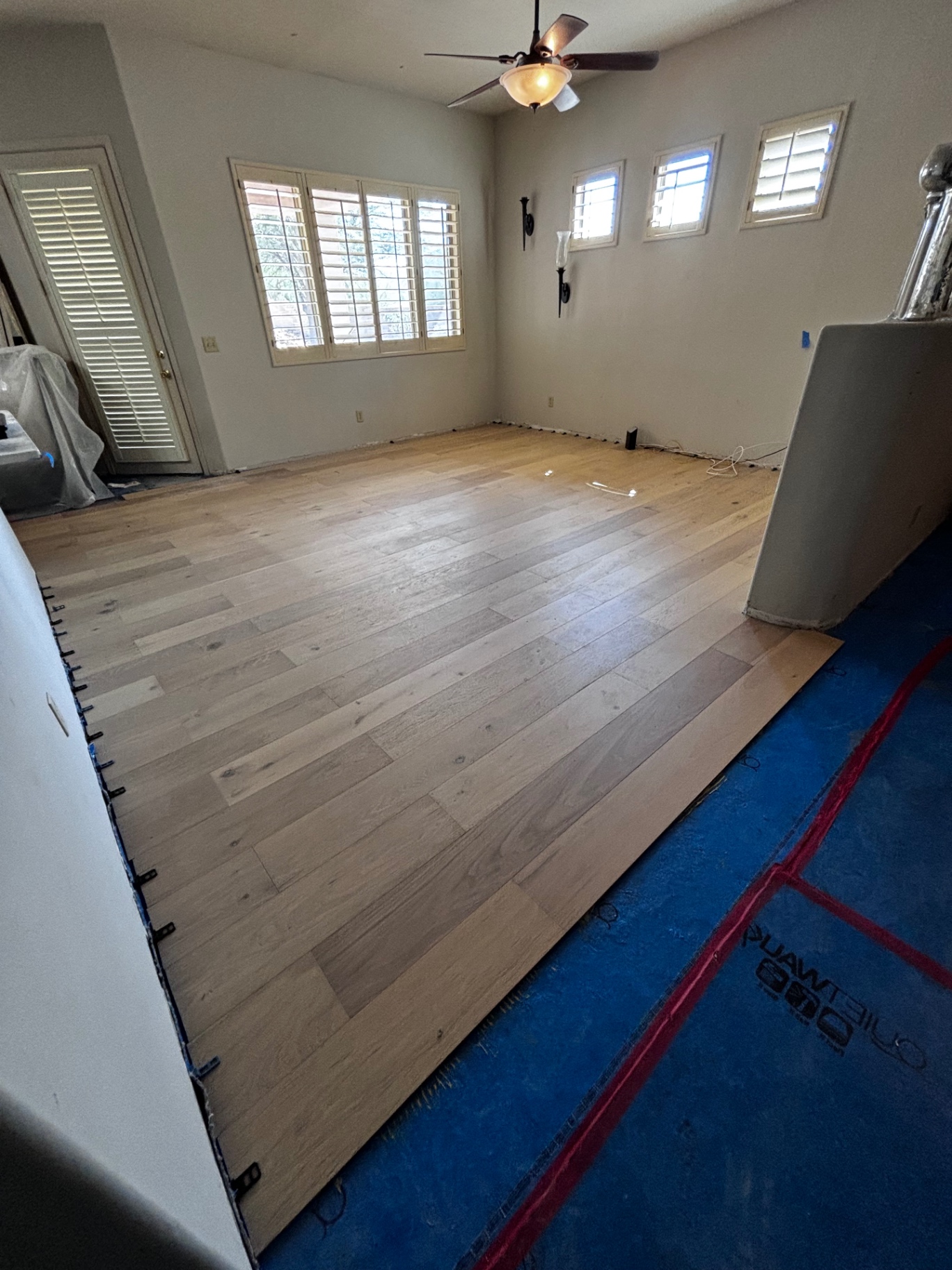 Engineered hardwood install in progress