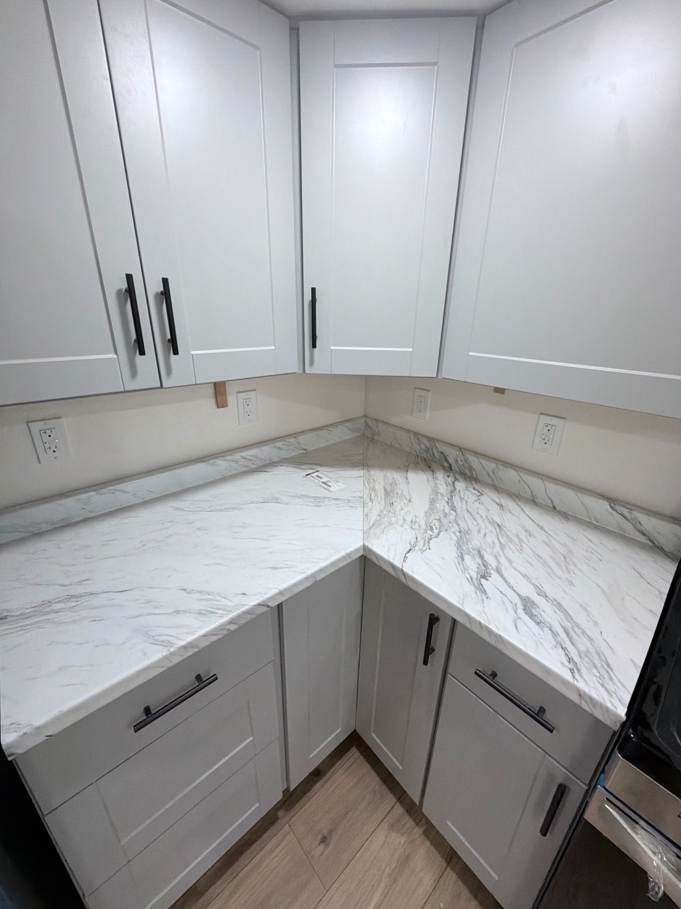 Marble-look laminate countertop corner detail