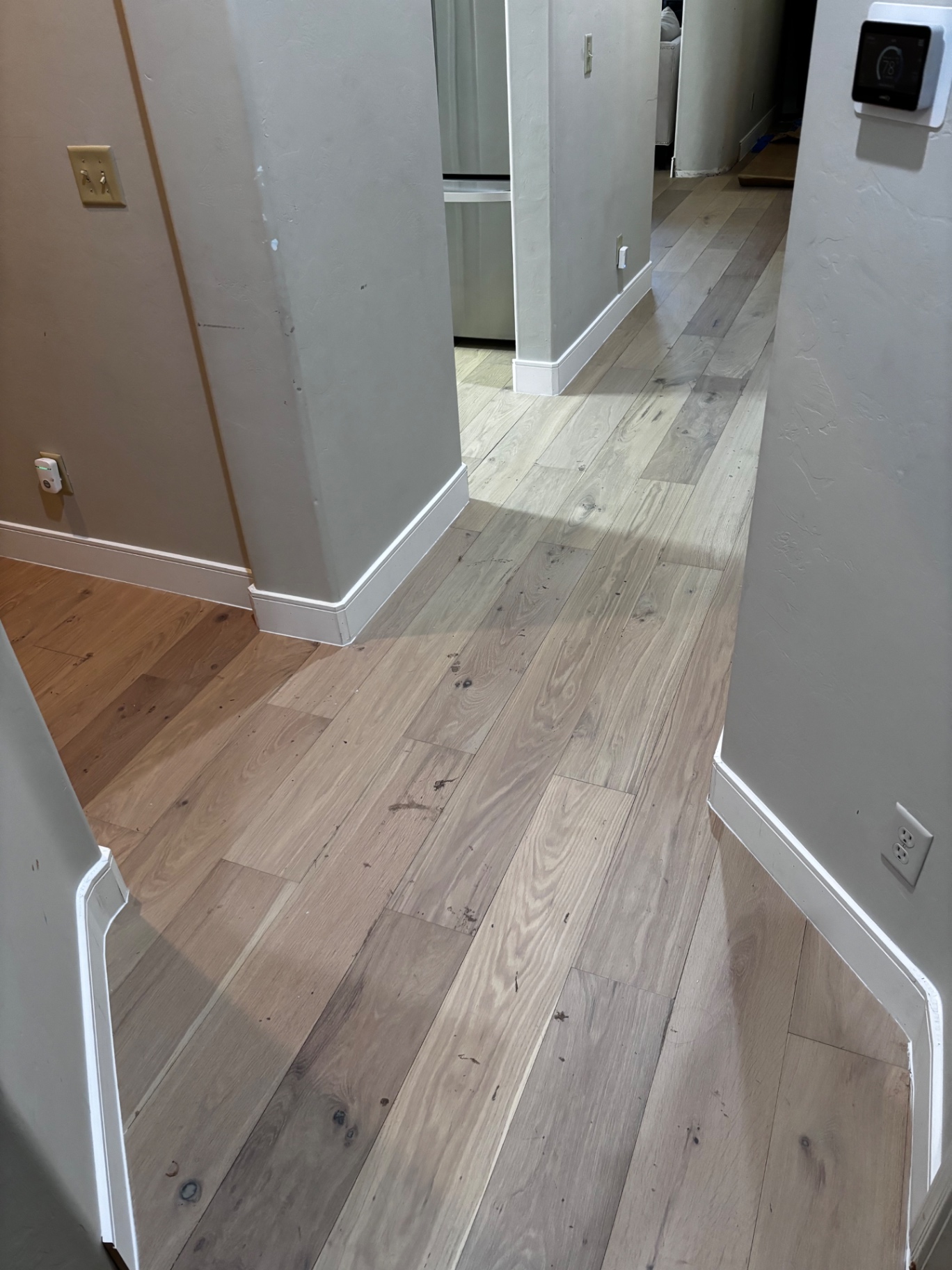 Finished hardwood flooring through hall